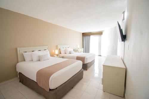Habitación Estándar del hotel Ocean View Cancun Arenas. Foto 1