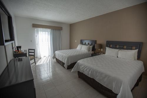 Habitación Estándar del hotel Ocean View Cancun Arenas. Foto 2