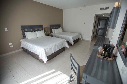 Habitación Estándar del hotel Ocean View Cancun Arenas. Foto 3
