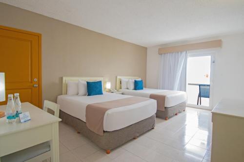 Habitación Estándar - Todo incluido del hotel Ocean View Cancun Arenas. Foto 3