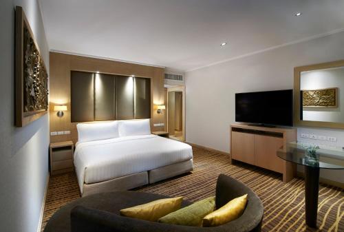Habitación Deluxe con cama extragrande del hotel Amari Bangkok