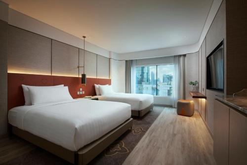 Habitación Premier con 2 camas individuales del hotel Amari Bangkok. Foto 1