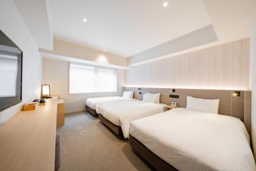 Habitación Triple del hotel Keio Prelia Kyoto Karasuma Gojo. Foto 3