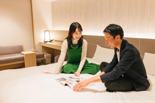 Habitación con cama extragrande. del hotel Keio Prelia Kyoto Karasuma Gojo. Foto 3