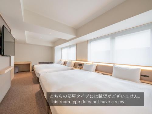 Habitación Cuádruple del hotel Keio Prelia Kyoto Karasuma Gojo. Foto 5