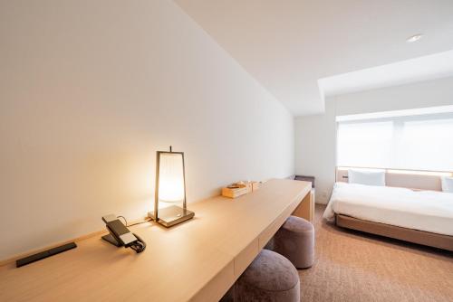 Habitación Cuádruple del hotel Keio Prelia Kyoto Karasuma Gojo. Foto 7