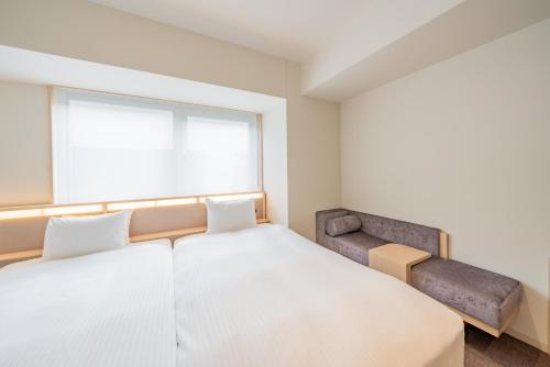Habitación Cuádruple del hotel Keio Prelia Kyoto Karasuma Gojo. Foto 8