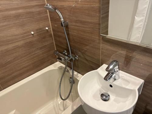 Habitación Triple Deluxe del hotel The OneFive Osaka Namba Kuromon