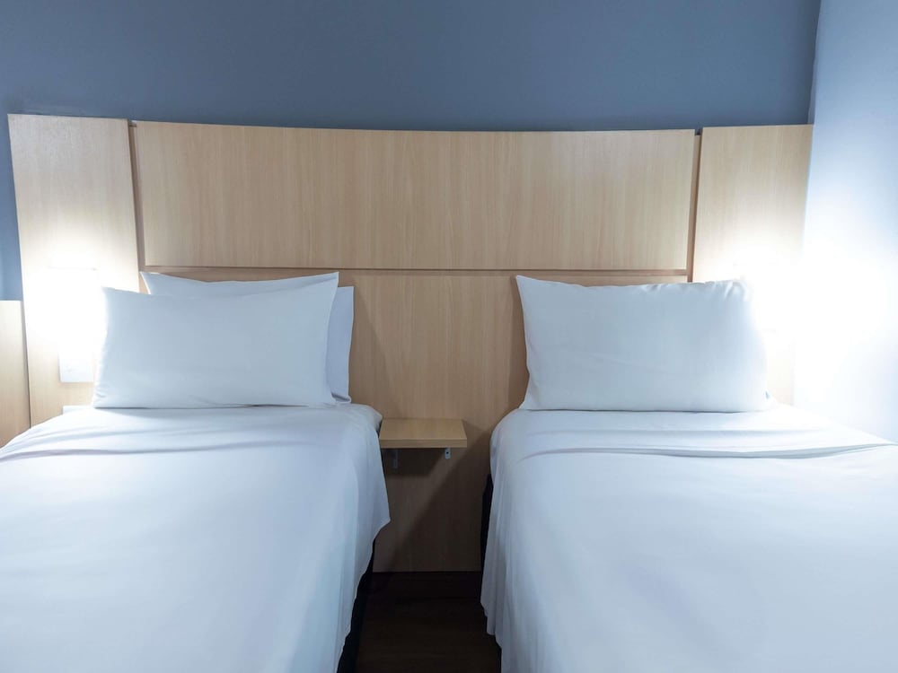 Habitación Standard con 2 camas individuales del hotel Ibis Contagem Ceasa. Foto 6