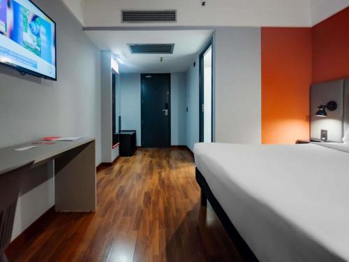 Habitación Doble Estándar del hotel ibis Guarulhos Aeroporto. Foto 7