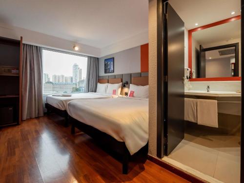 Habitación Cuádruple del hotel ibis Guarulhos Aeroporto. Foto 2