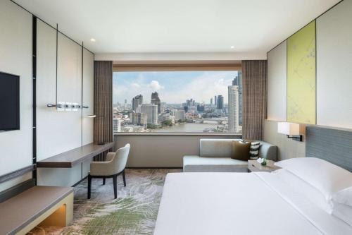 Habitación Premium con cama extragrande del hotel Millennium Hilton Bangkok