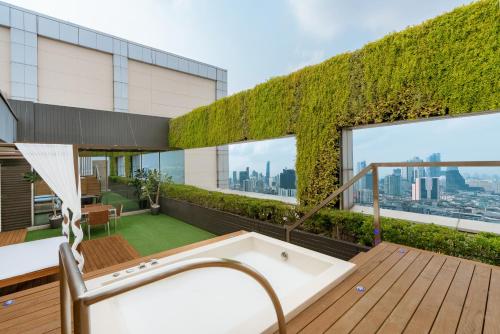 Suite Pathumwan con terraza del hotel Pathumwan Princess