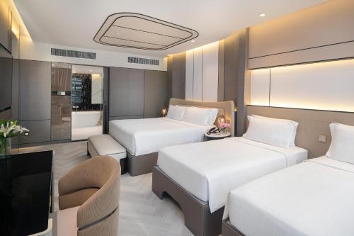 Suite Familiar de 1 dormitorio del hotel Pathumwan Princess. Foto 2