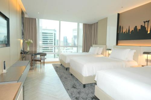 Habitación Grand Deluxe Triple del hotel Pathumwan Princess
