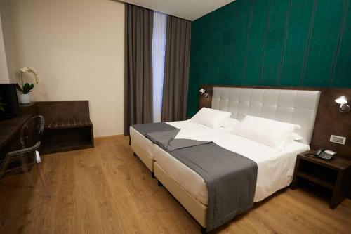 Habitación Doble Deluxe - 2 camas del hotel Concord. Foto 1