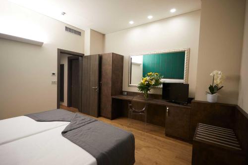Habitación Doble Deluxe - 2 camas del hotel Concord. Foto 2