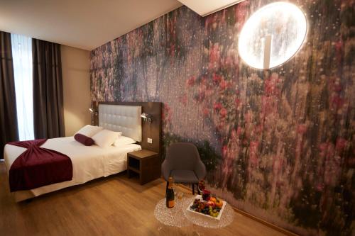 Habitación Deluxe con cama extragrande y baño turco del hotel Concord. Foto 5