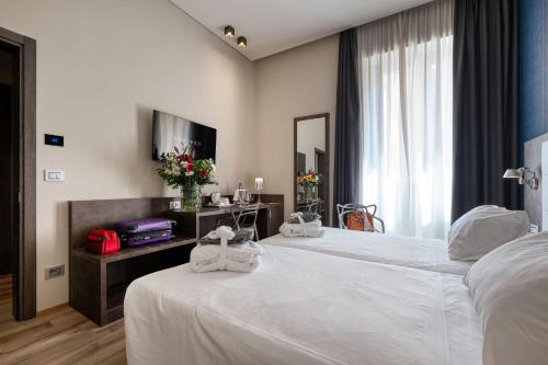 Habitación Deluxe con 2 camas grandes del hotel Concord. Foto 3