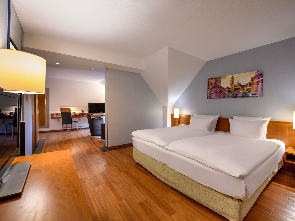 Habitación Premium, 1 cama de matrimonio grande del hotel Mövenpick Egerkingen