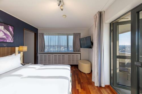 Suite con balcón y vistas al centro histórico del hotel Radisson Blu Lietuva