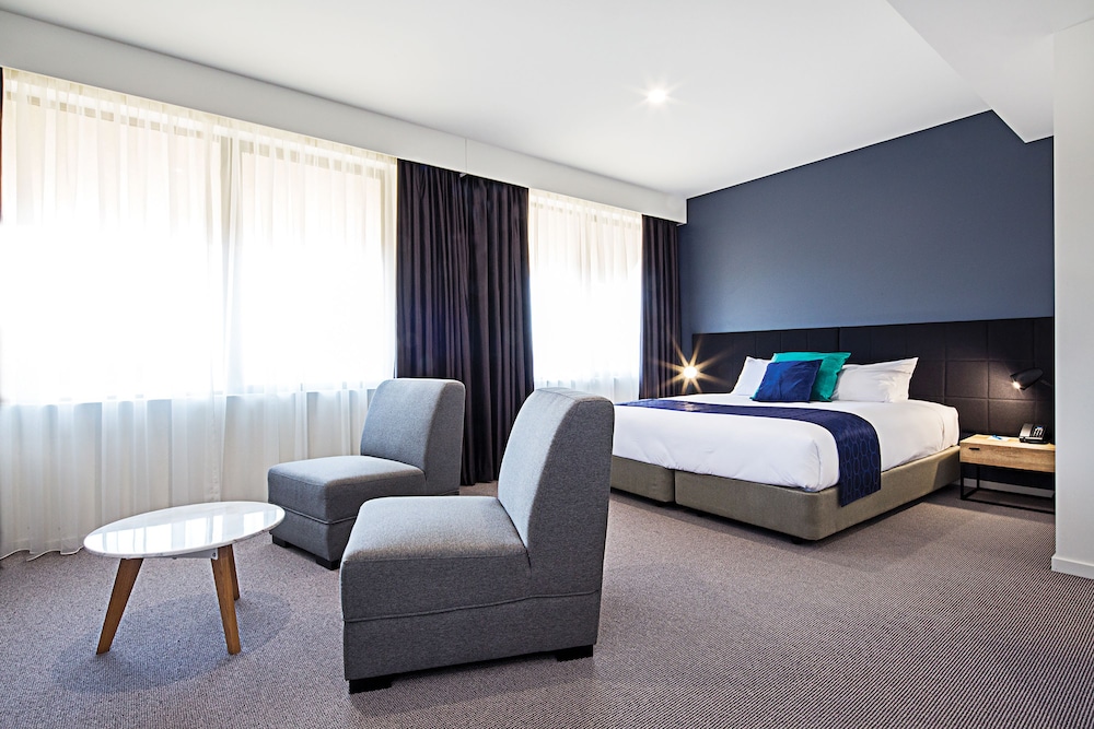 Suite con 1 cama King o 2 camas individuales del hotel Mantra Macarthur. Foto 1