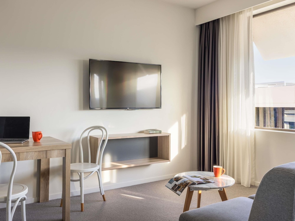 Suite Deluxe con 1 cama King o 2 camas individuales del hotel Mantra Macarthur. Foto 1