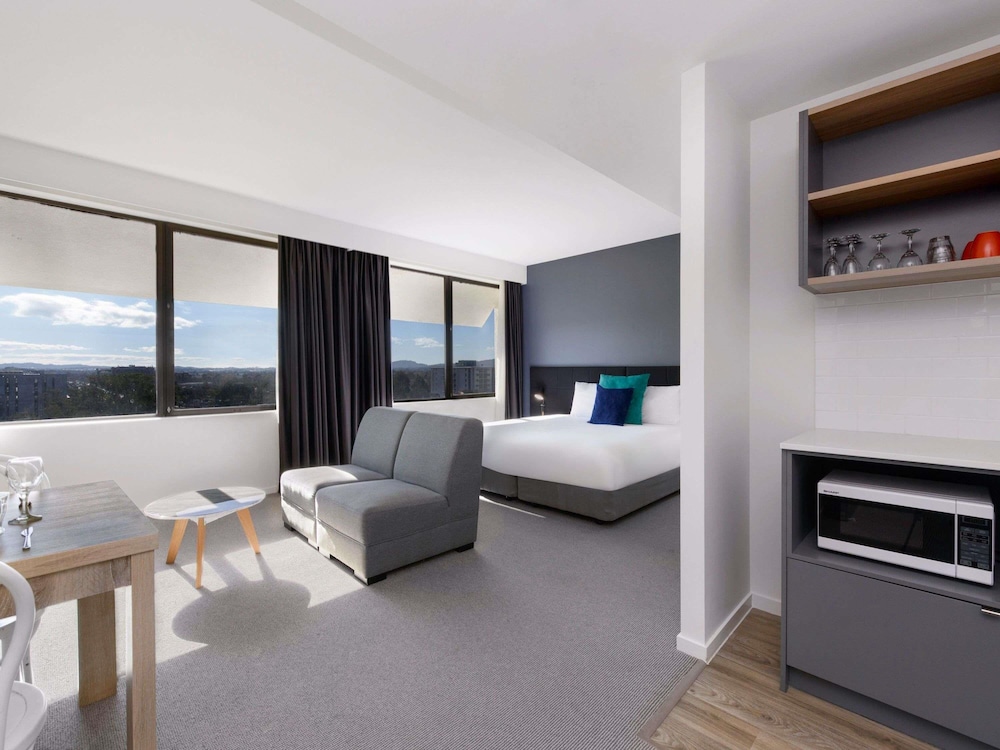 Suite Deluxe con 1 cama King o 2 camas individuales del hotel Mantra Macarthur. Foto 2
