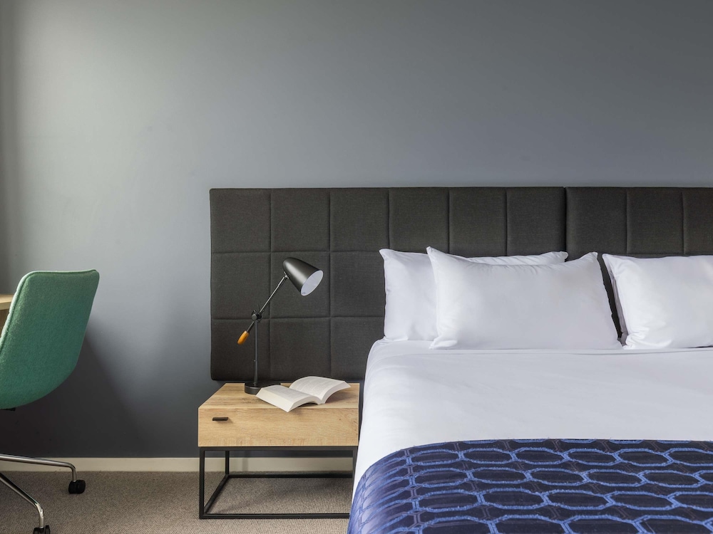 Estudio Deluxe con 1 cama King del hotel Mantra Macarthur. Foto 11