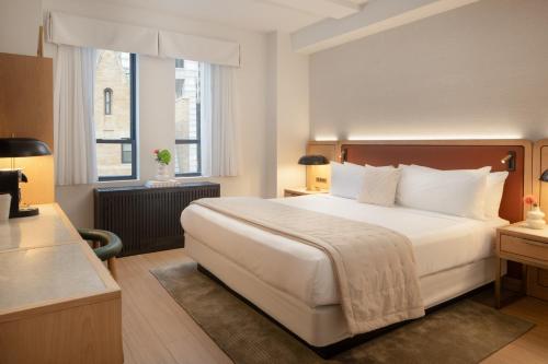 Habitación Deluxe Queen del hotel Aura Times Square. Foto 2