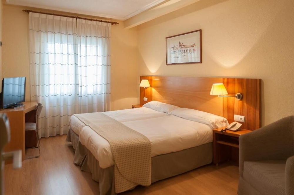Habitación con 1 cama doble o 2 individuales del hotel Mercado by gaiarooms