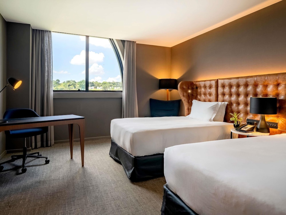 Habitación Deluxe, 2 camas individuales, planta alta del hotel Pullman São Paulo Guarulhos Airport. Foto 4