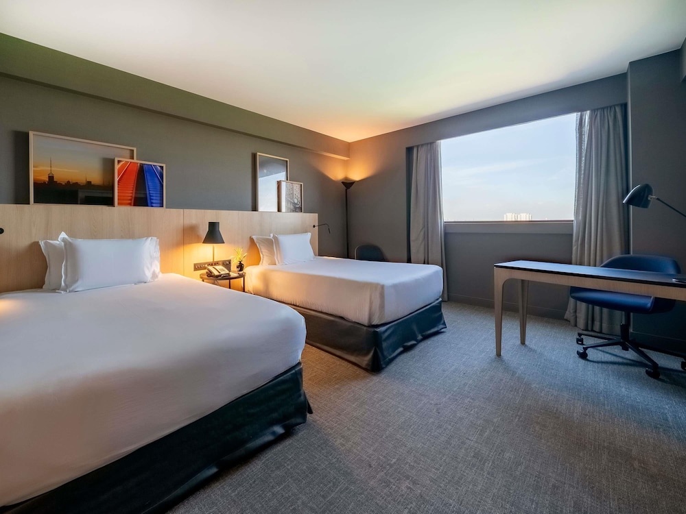 Habitación ejecutiva, 2 camas individuales, bañera del hotel Pullman São Paulo Guarulhos Airport. Foto 1