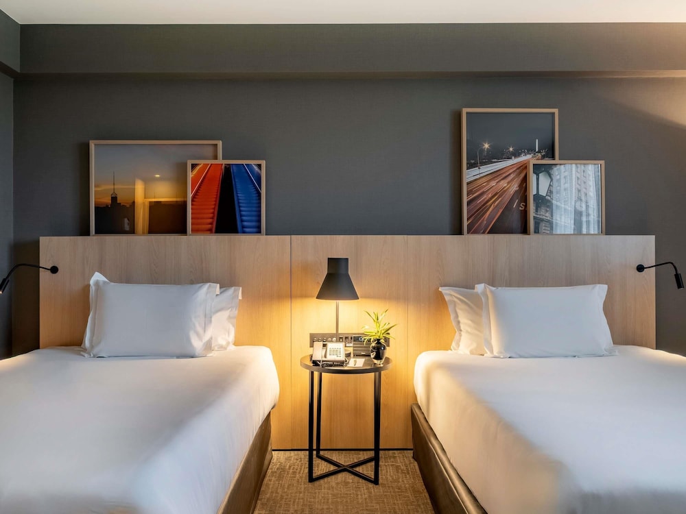 Habitación ejecutiva, 2 camas individuales, bañera del hotel Pullman São Paulo Guarulhos Airport. Foto 2
