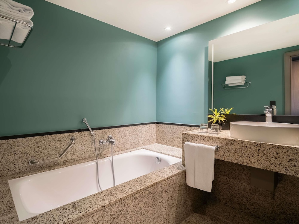 Habitación ejecutiva, 2 camas individuales, bañera del hotel Pullman São Paulo Guarulhos Airport. Foto 5