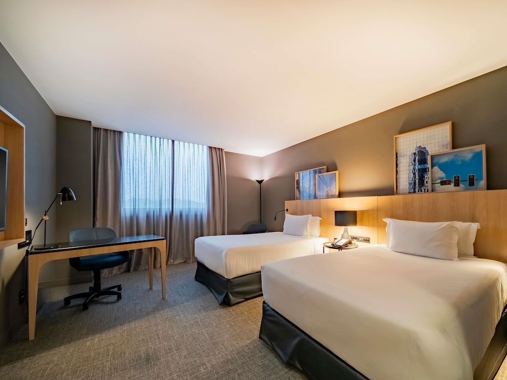 Habitación de lujo, 2 camas individuales del hotel Pullman São Paulo Guarulhos Airport. Foto 1