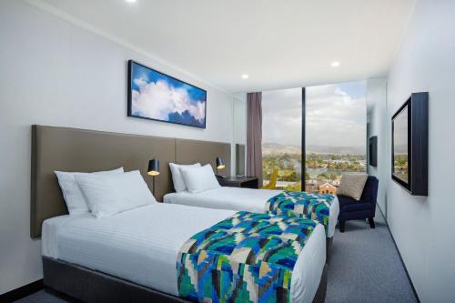 Estudio con 2 camas individuales del hotel Mantra Albury. Foto 3