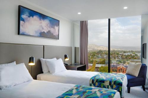 Estudio con 2 camas individuales del hotel Mantra Albury. Foto 5