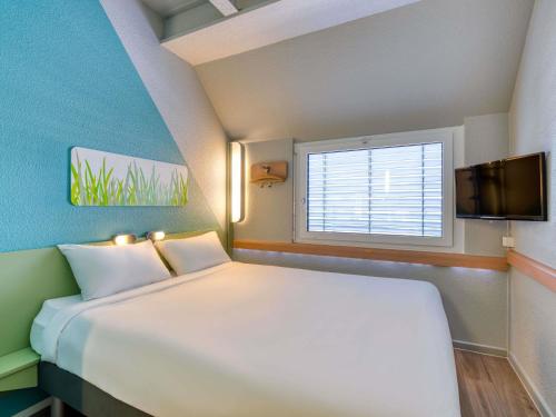 Habitación Doble con cama doble del hotel Ibis Budget Luzern City