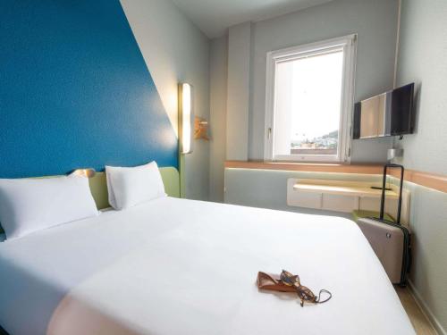 Habitación Doble con cama doble del hotel Ibis Budget Luzern City. Foto 9