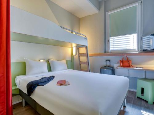 Habitación Doble Estándar - 2 camas del hotel Ibis Budget Luzern City. Foto 5