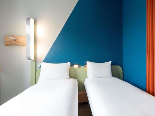 Habitación Doble Estándar - 2 camas del hotel Ibis Budget Luzern City. Foto 8