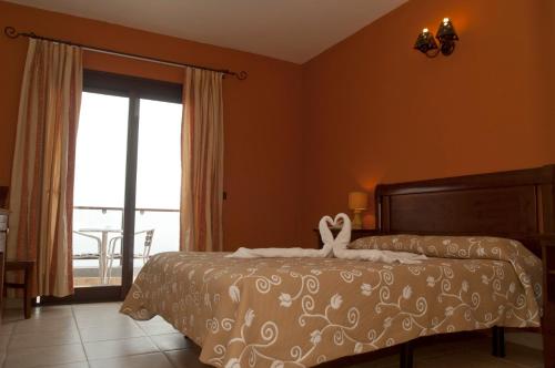 Habitación Doble con terraza del hotel Villa El Mocanal. Foto 8