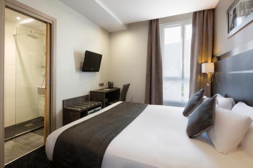 Habitación Doble Estándar del hotel Hotel Paris Italie. Foto 3