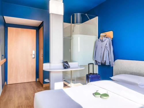 TWIN - habitación con dos camas individuales, 90 x 200 cm. del hotel Ibis Budget Lausanne Bussigny. Foto 4