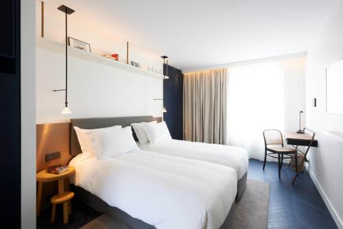 Habitación Doble Deluxe del hotel Perpetual Elysée Montaigne
