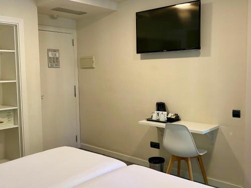 Habitación Doble con Cama supletoria del hotel Bcn Urbaness Del Comte