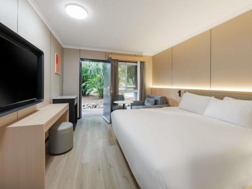 Habitación Clásica con 1 cama king size del hotel Mercure Townsville. Foto 3
