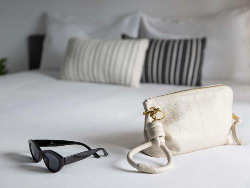 Habitación con cama grande y litera del hotel COFFS HARBOUR BUDGET STAY. Foto 4