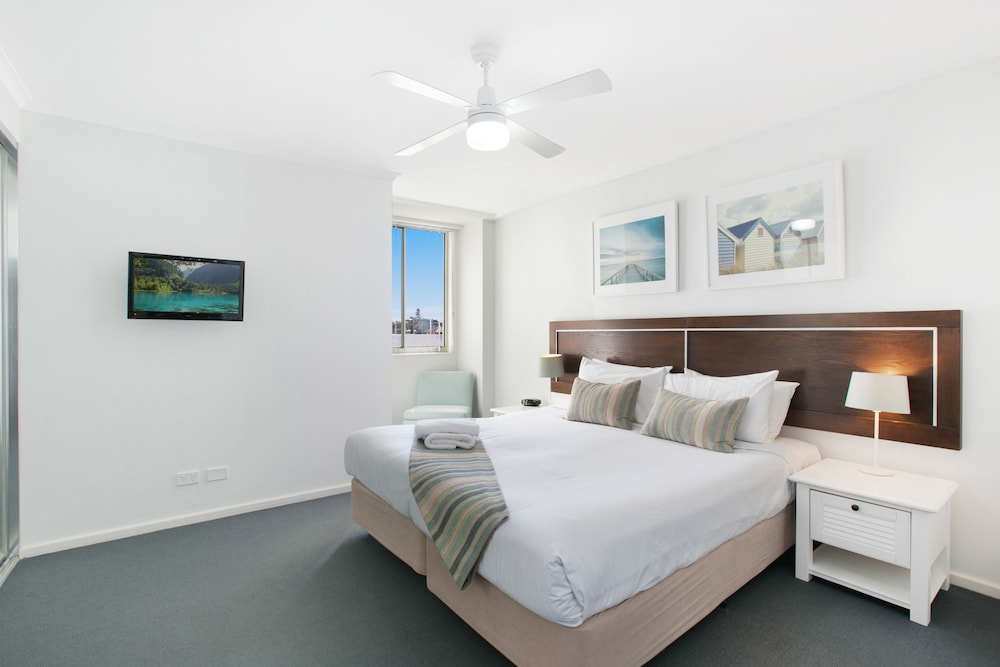 Apartamento de 1 dormitorio con vistas a la piscina del hotel Mantra Nelson Bay. Foto 1